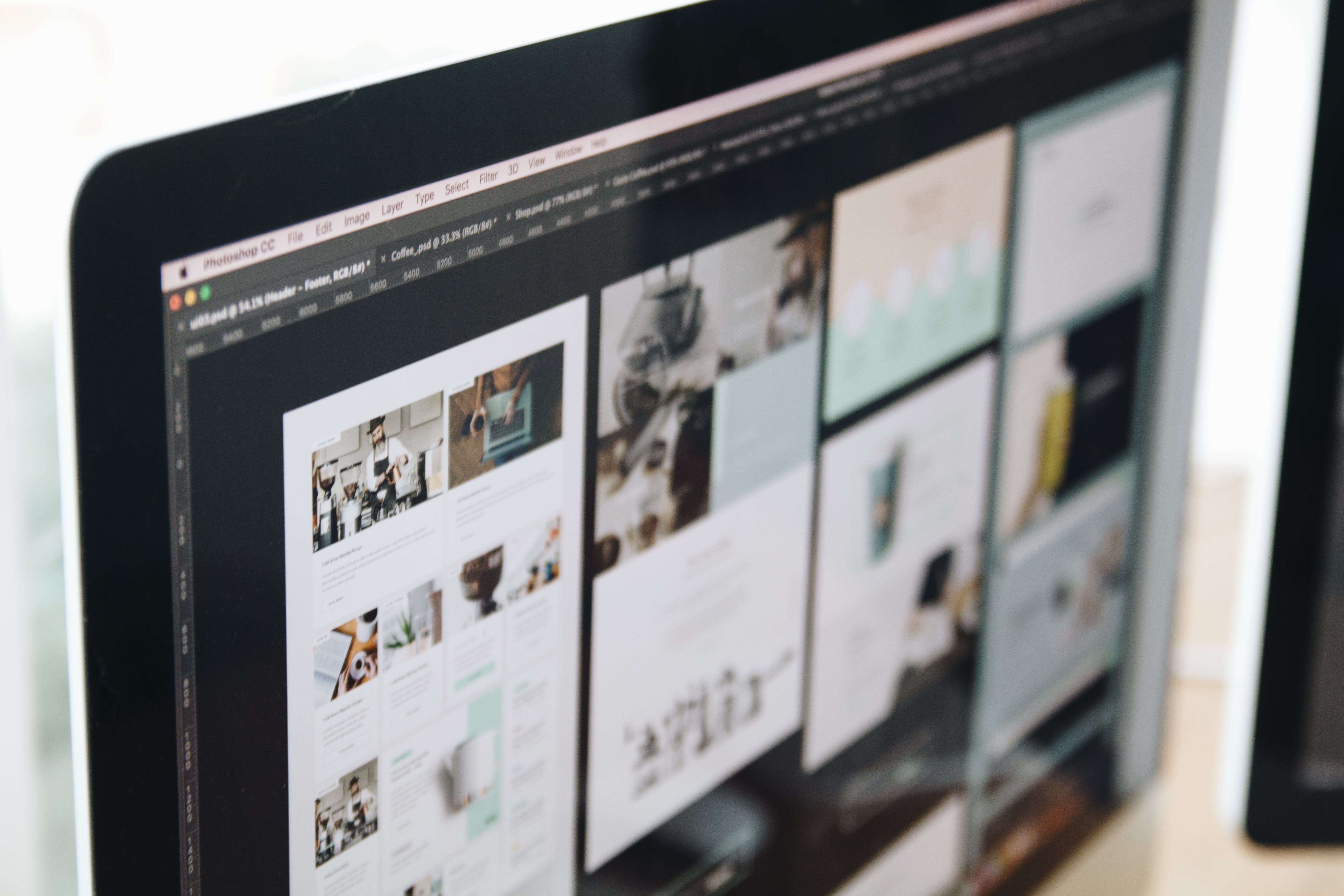 Computer screen showing layouts in Adobe InDesign
